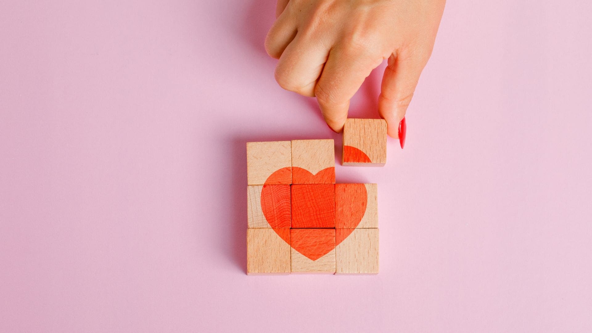 woman taking heart apart showing a relationship dealbreaker