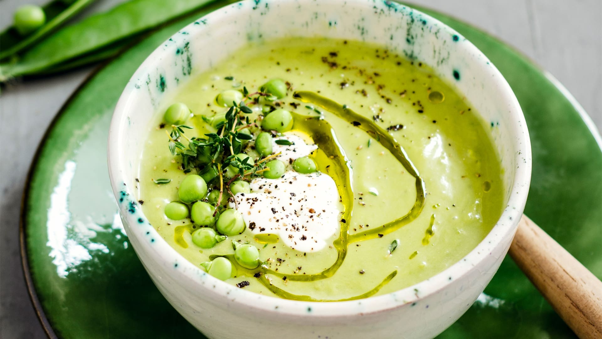 bowl of green soup made from a pea soup recipe