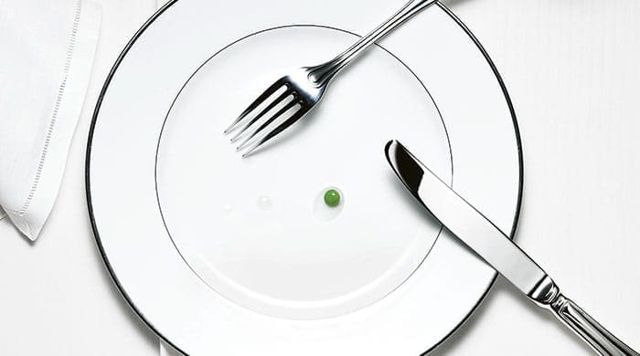 A plate with tiny portions of food