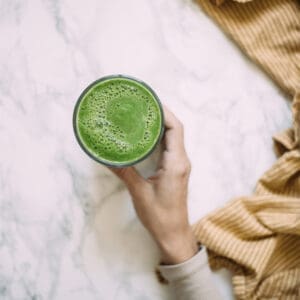 kale smoothie on marble background
