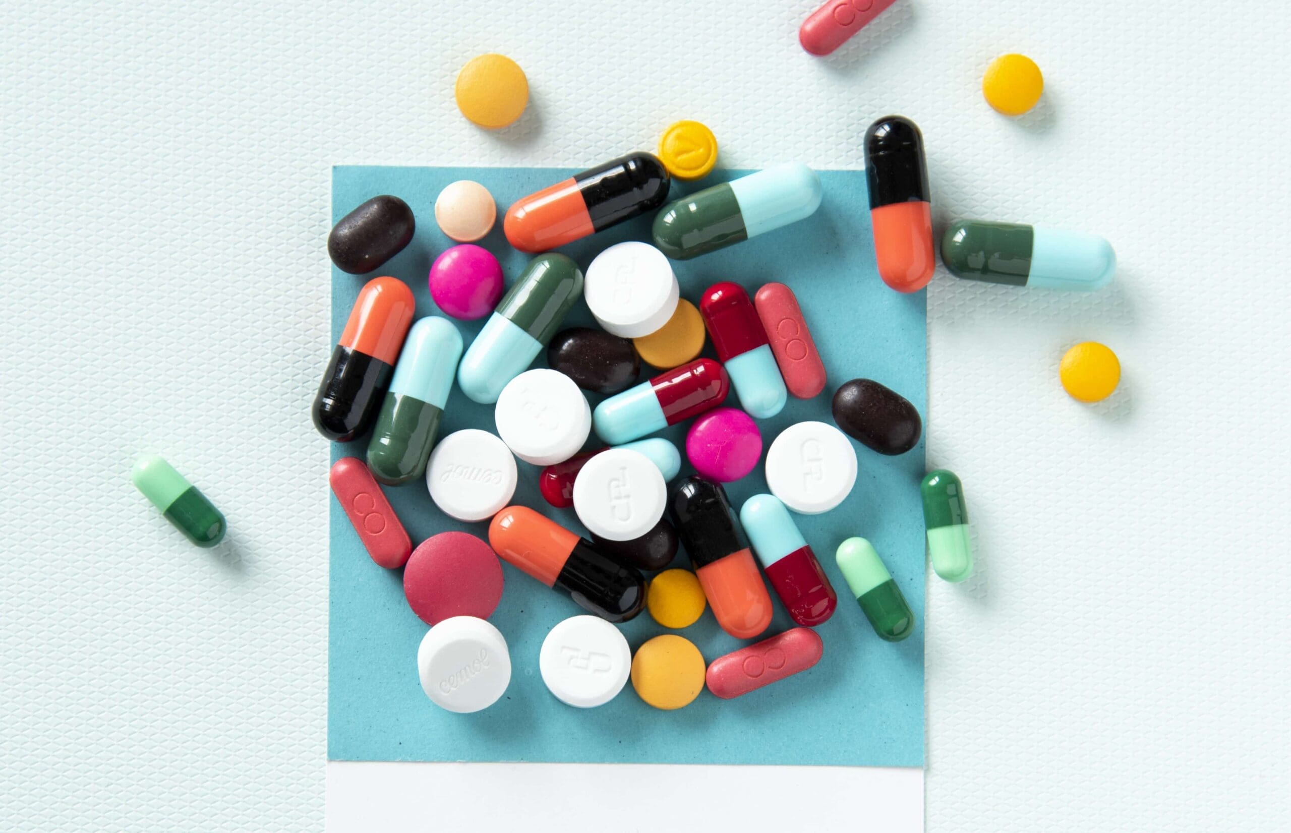supplements shot on a light blue background