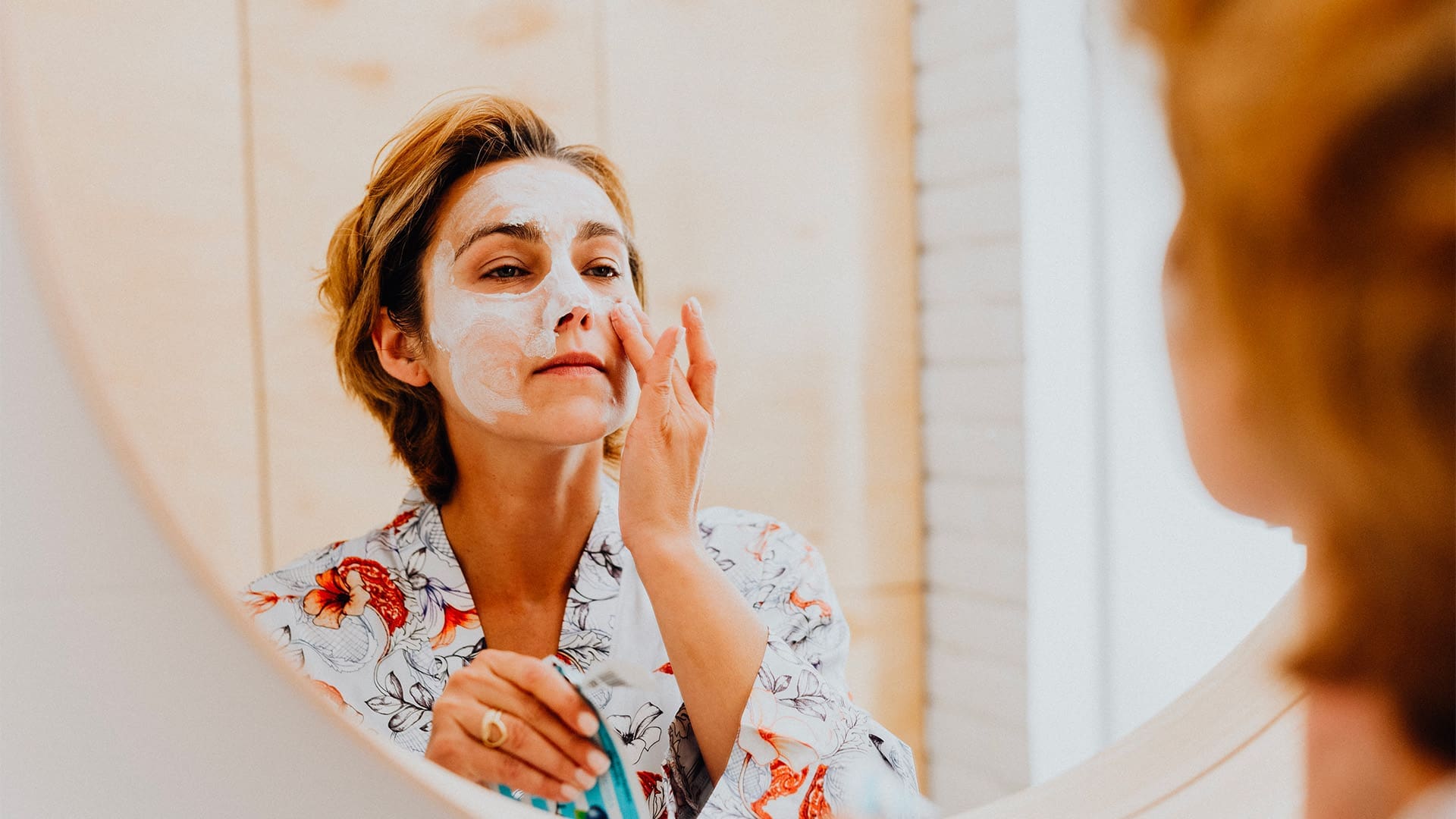woman pampering herself with Mother's day gifts