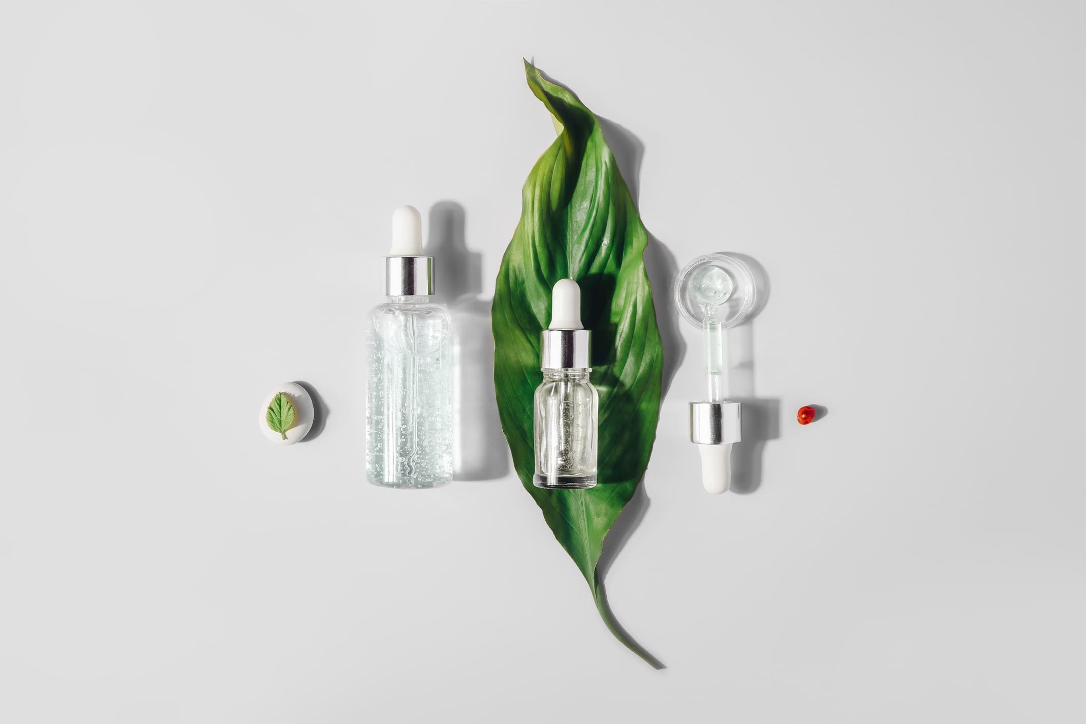 local beauty brands Natural Serums. Concept of cosmetic injection is hyaluronic acid, botulin, serum. Still life, Flat lay