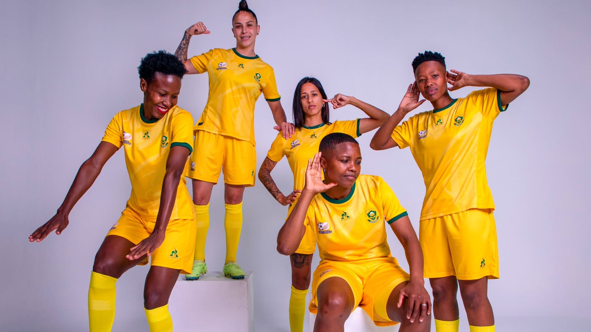 women wearing the new Le Coq Sportif Banyana Bafana fan gear