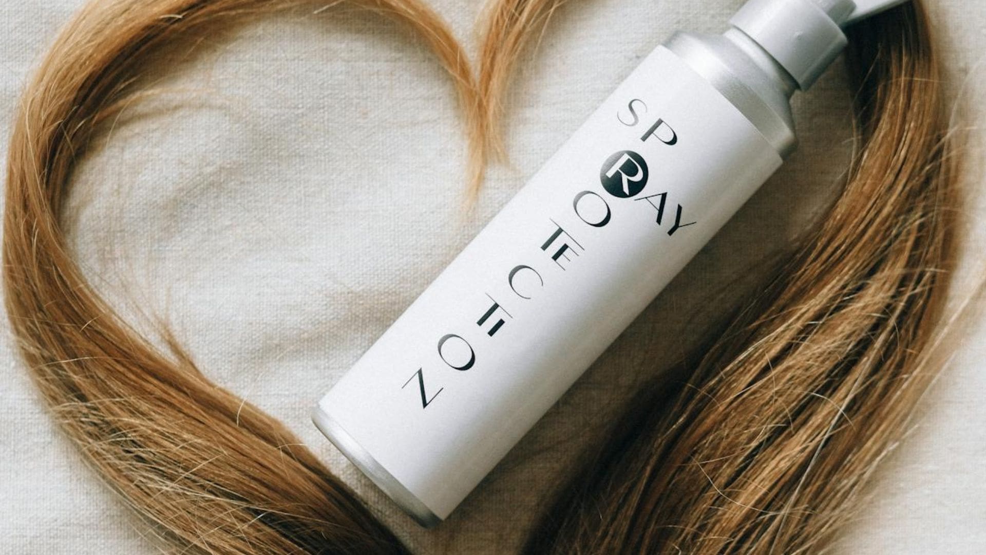 Hair Spray on Top of Hair Shaped as a heart