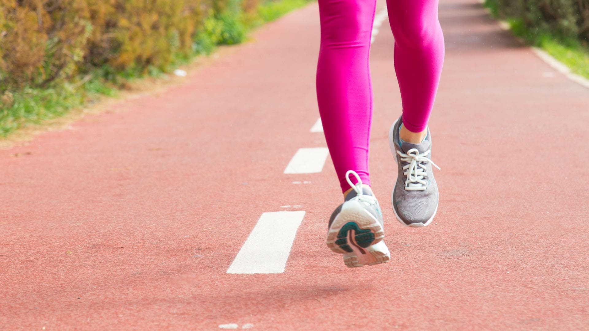 Woman running with pink leggins