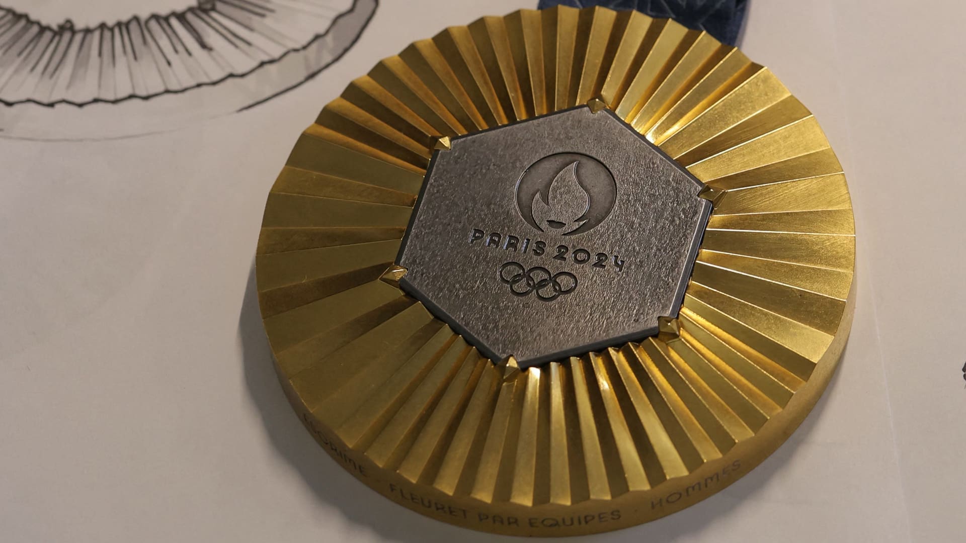 close up of the Paris 2024 medal to show how much olympic athletes get paid for medals