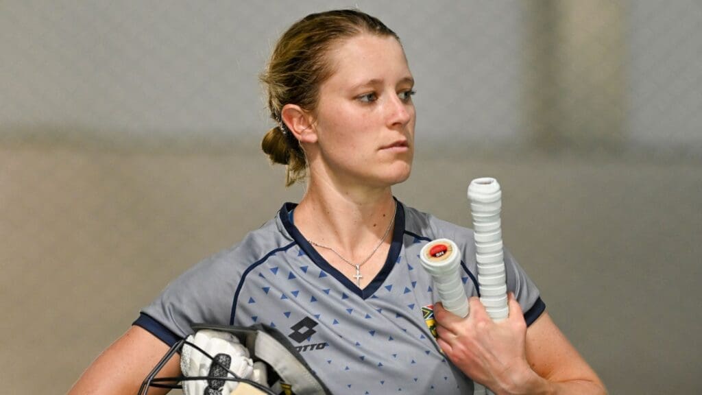 anneke bosch t20 world cup holding bat and glove looking to the side seriously