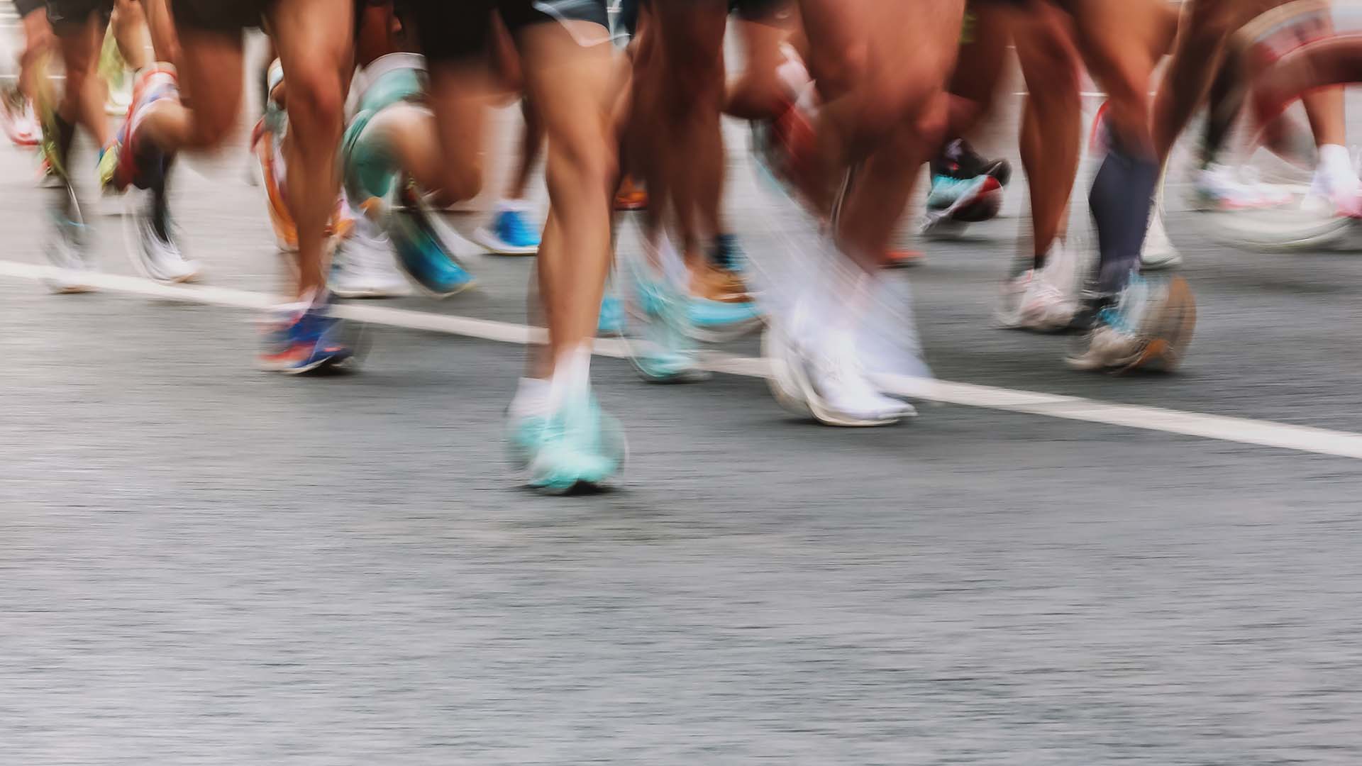 Unfocused section of people running a Marathon